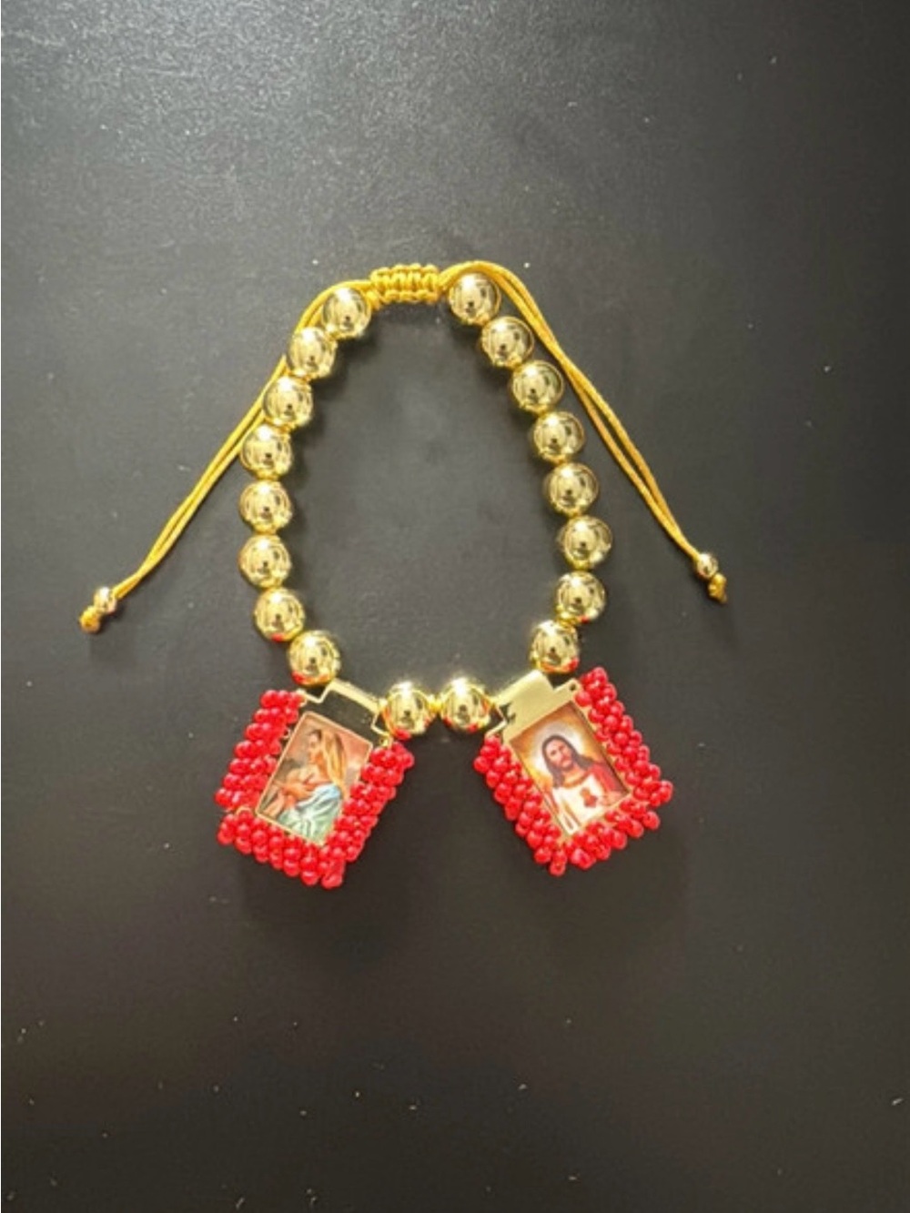 Gold Bead Religious Charm Bracelet with Red Beaded Pendants